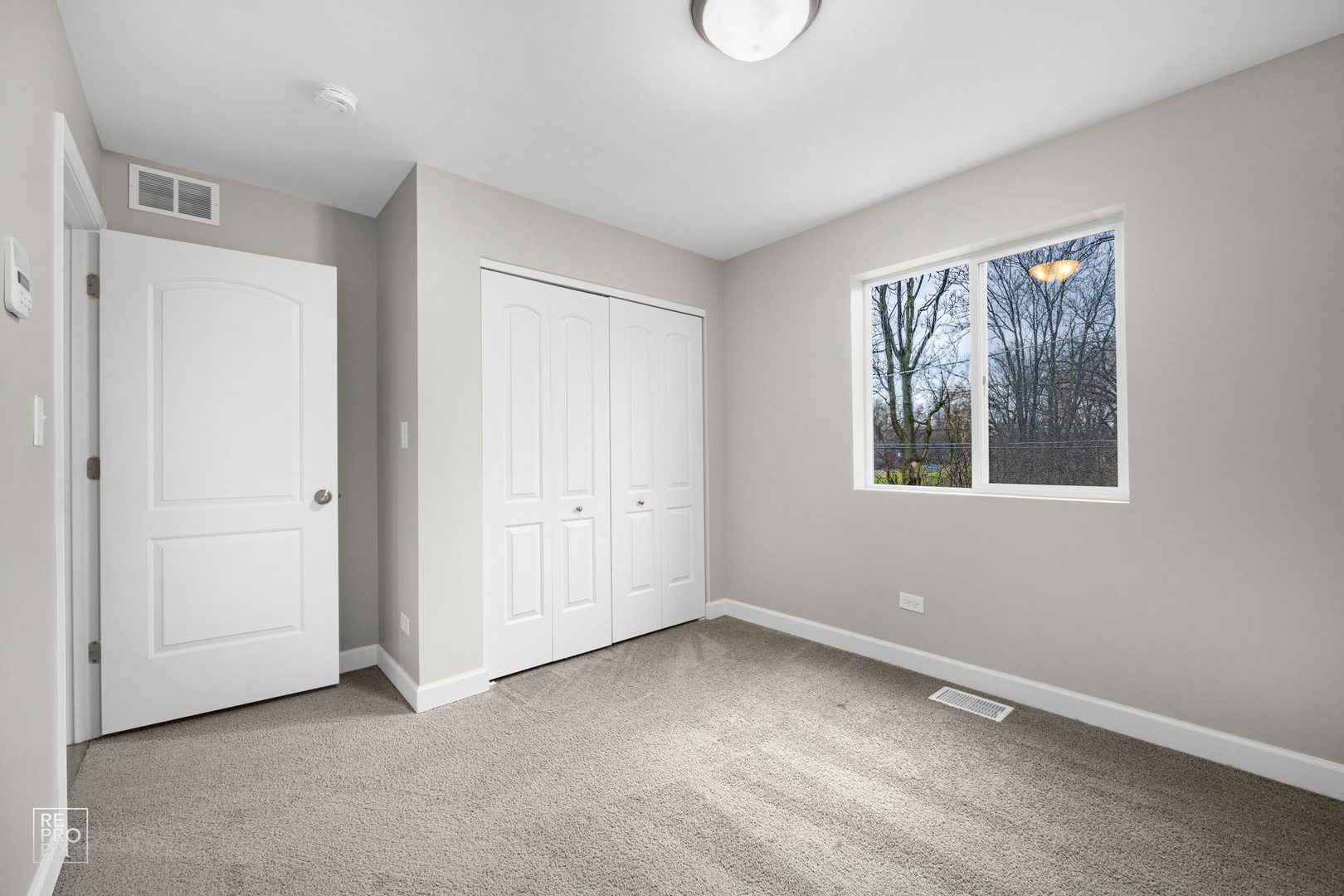 3707 139th Place Robbins, IL 60472 - Photo 17 of 27 a view of an empty room with a window