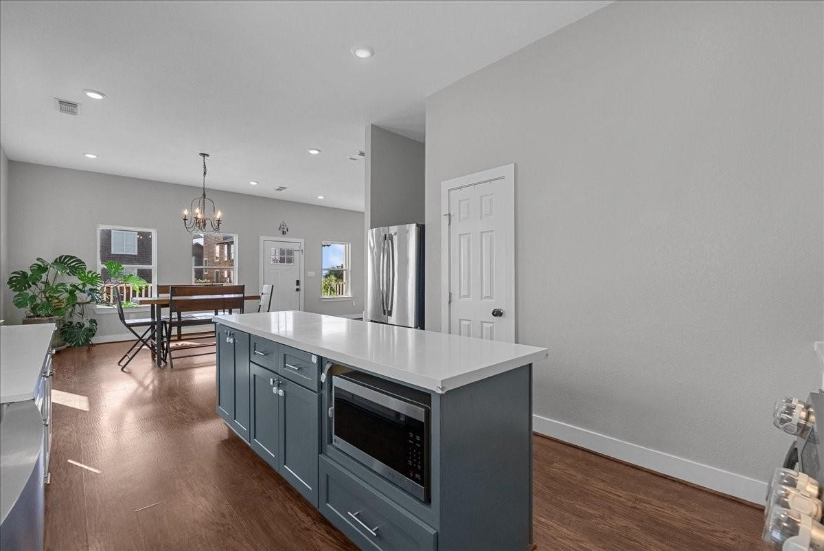 1205 Todville Road Seabrook, TX 77586 - Photo 13 of 37 a large kitchen with a table and chairs