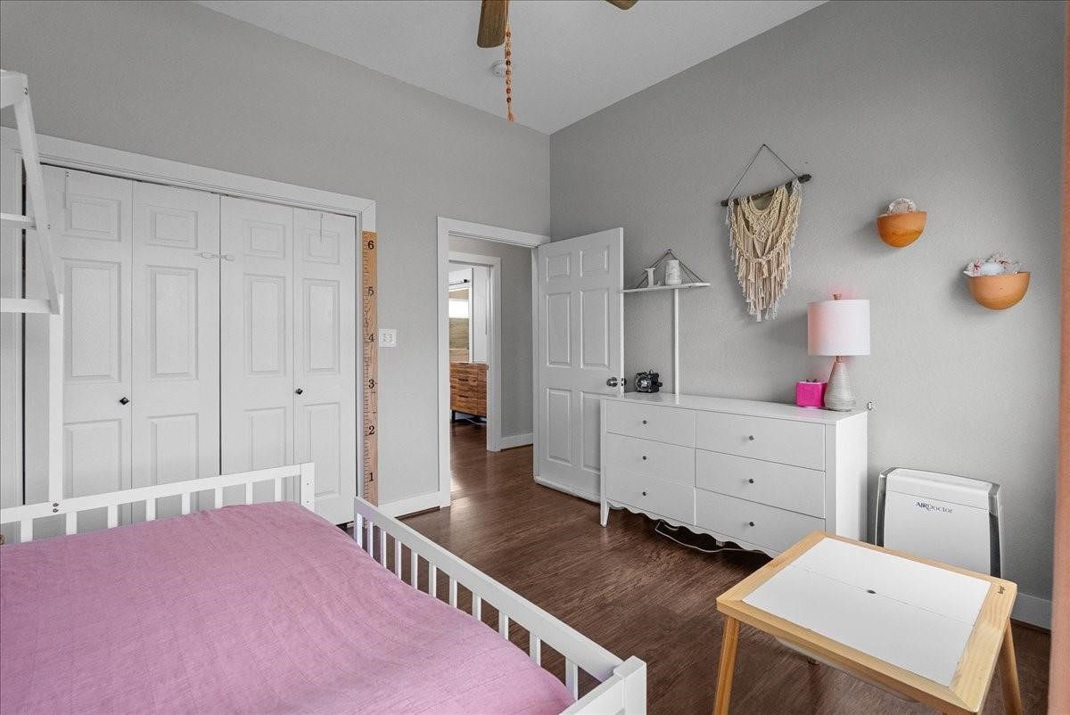 1205 Todville Road Seabrook, TX 77586 - Photo 26 of 37 a bedroom with a bed and a dresser