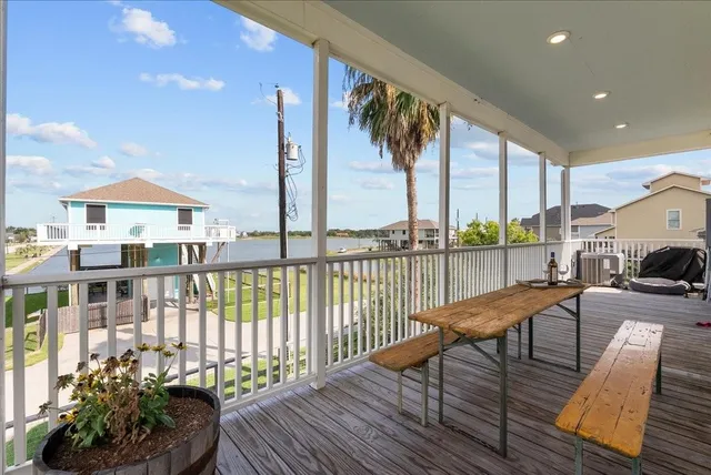 a view of balcony with furniture