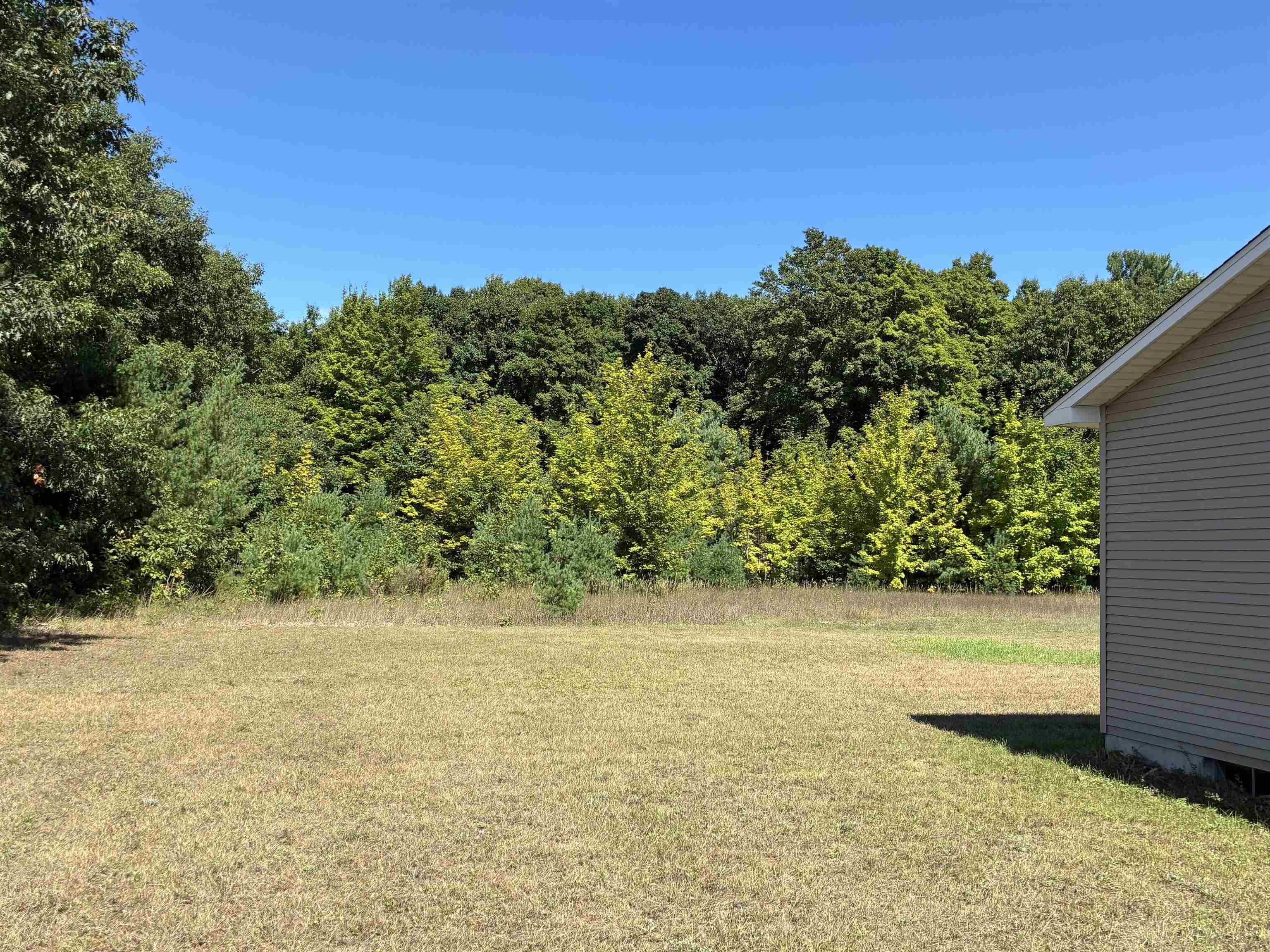 9966 Cedar Run Road Traverse City, MI 49684 - Photo 6 of 33 1950427-d88a8296-9a09-40e7-b3db-e5601a5974bb.JPG