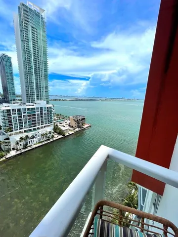 a view of swimming pool from a balcony