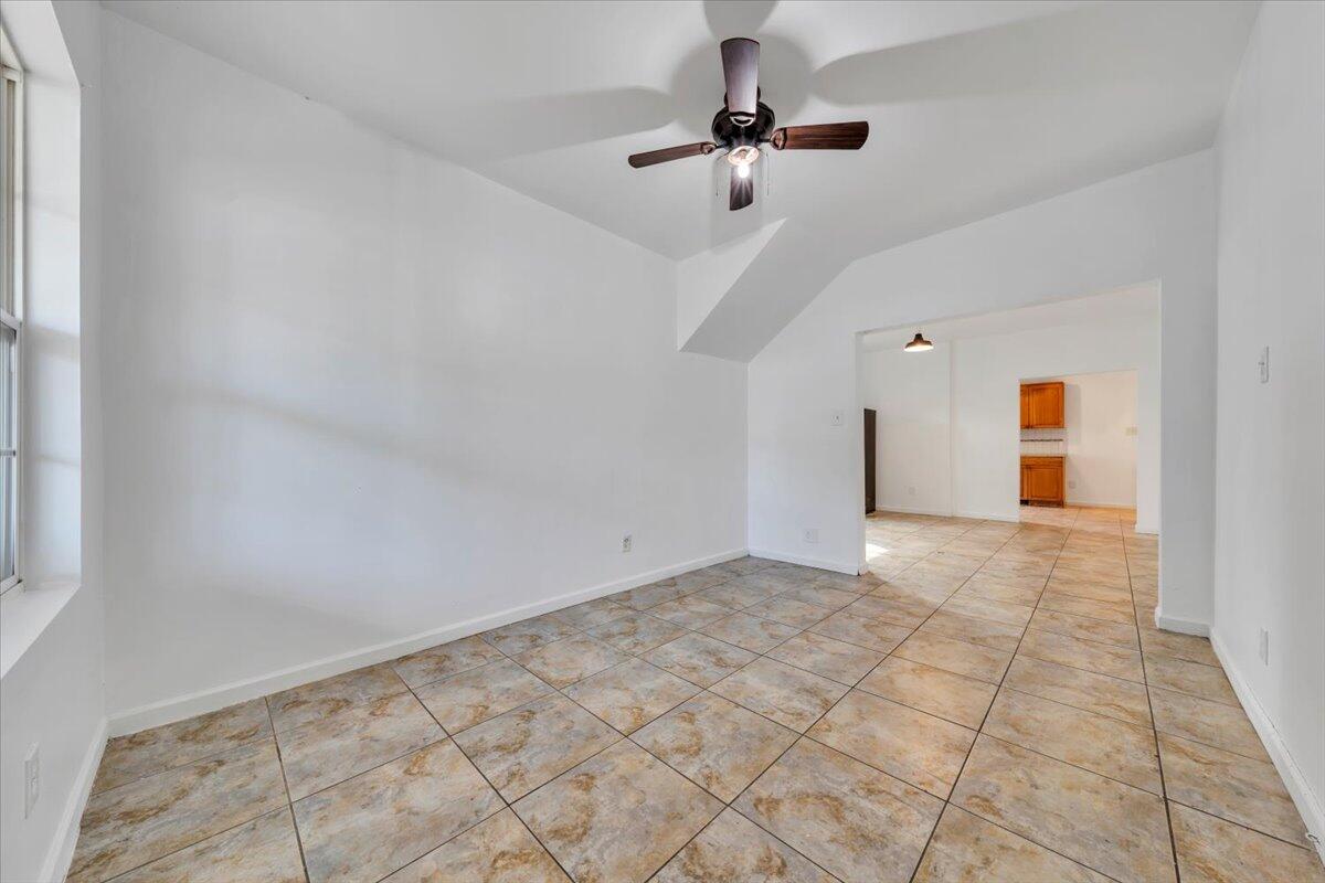 1013 Jamison Avenue Southeast Roanoke, VA 24013 - Photo 2 of 20 a view of an empty room with a window