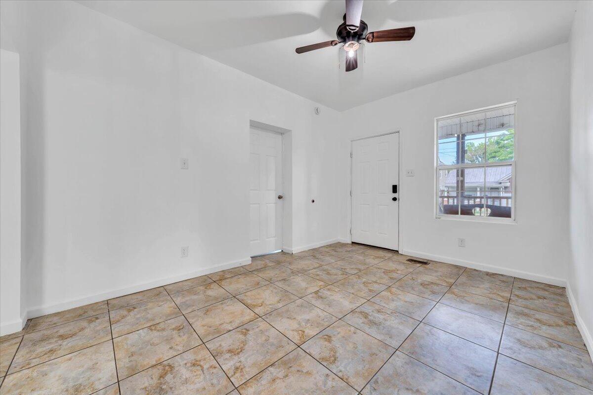 1013 Jamison Avenue Southeast Roanoke, VA 24013 - Photo 4 of 20 a view of an empty room and window