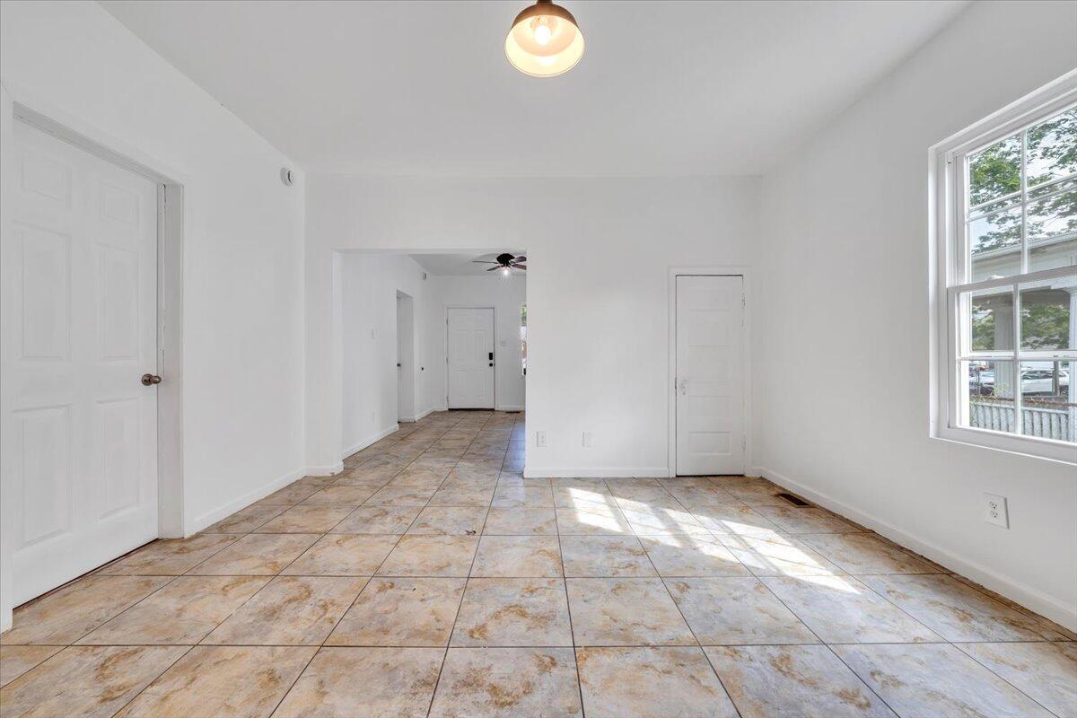 1013 Jamison Avenue Southeast Roanoke, VA 24013 - Photo 10 of 20 a view of an empty room with a window