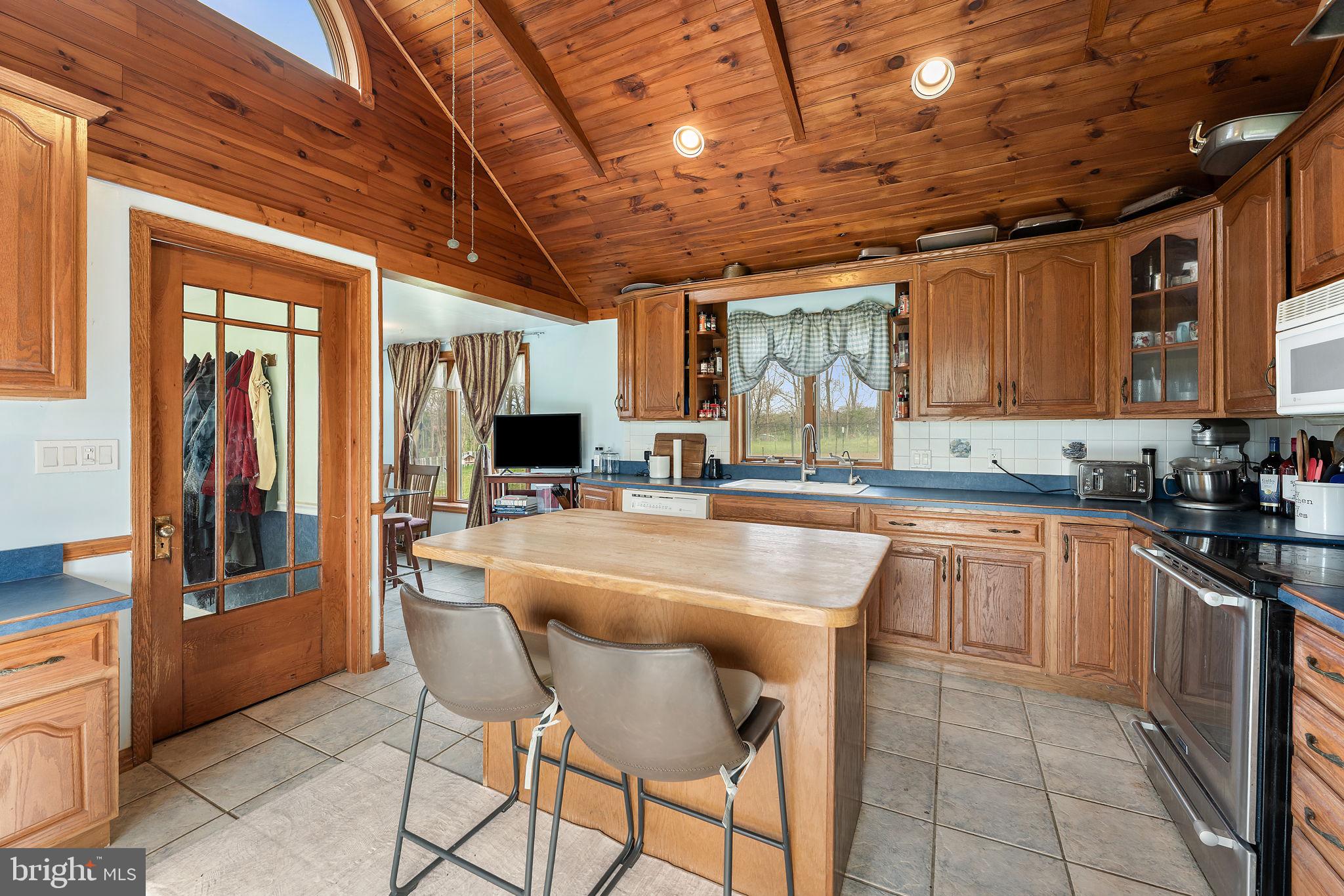 420 Russell Road Berryville, VA 22611 - Photo 27 of 60 Charming kitchen with rustic warmth.