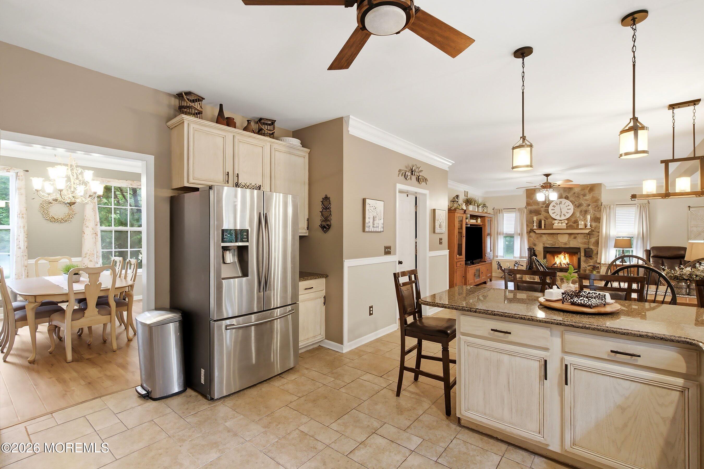 19 Goldfinch Road Jackson, NJ 08527 - Photo 7 of 51 12-Kitchen & Formal Dining with Fire