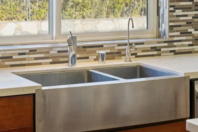 a spacious bathroom with a large tub and shower