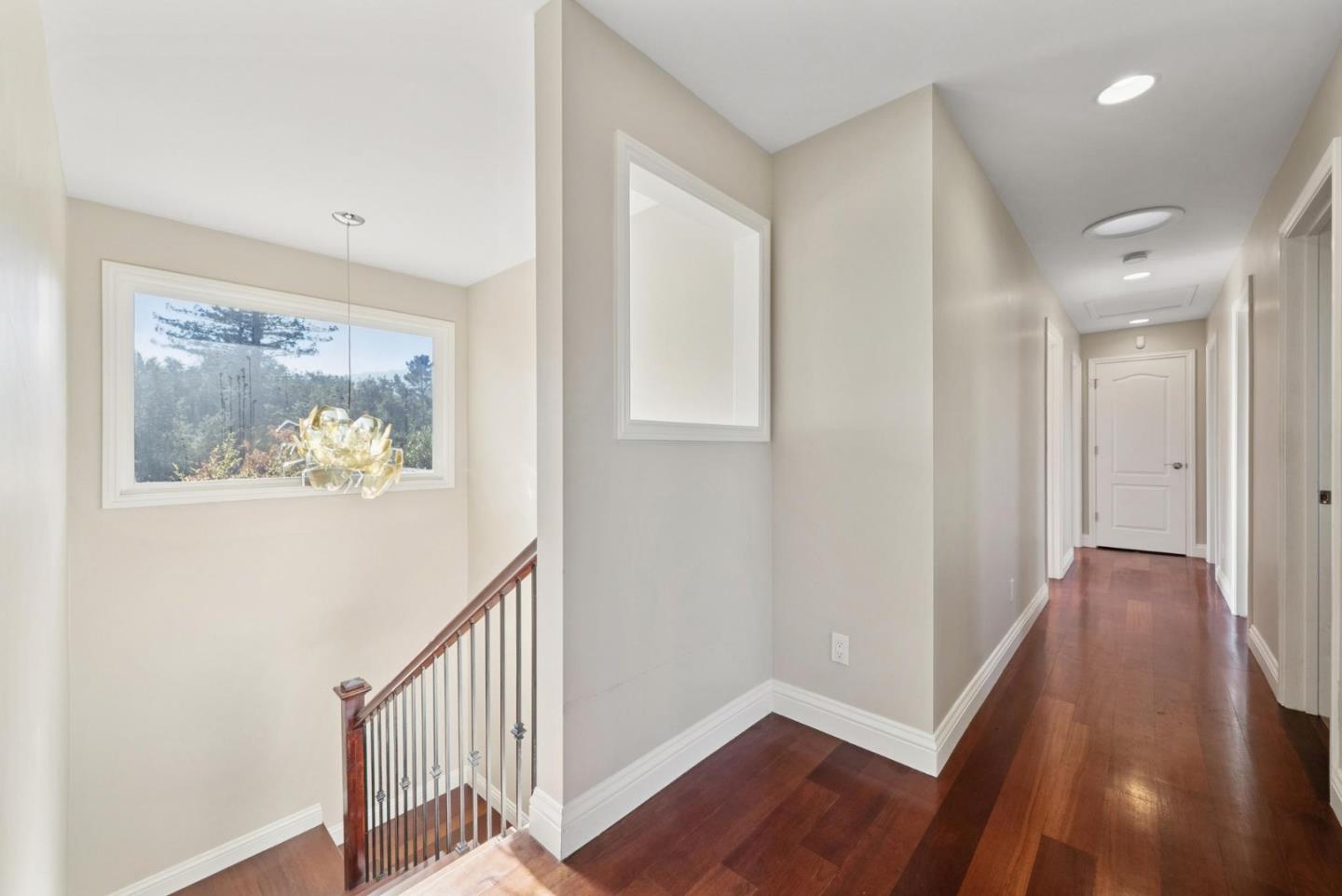 900 Highlands Circle Los Altos, CA 94024 - Photo 31 of 76 a view of a hallway with wooden floor