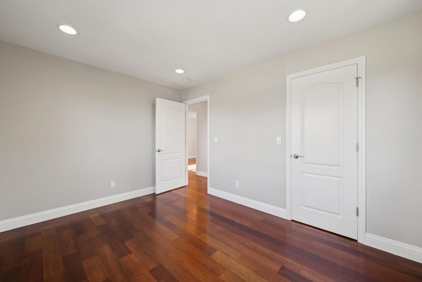 900 Highlands Circle Los Altos, CA 94024 - Photo 52 of 76 a view of an empty room with wooden floor