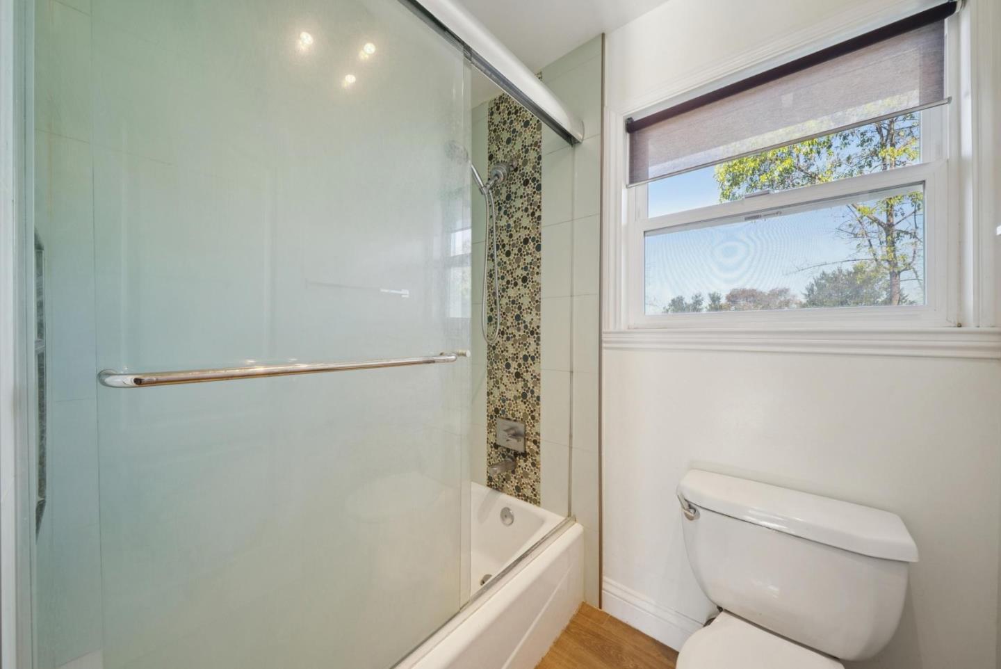 900 Highlands Circle Los Altos, CA 94024 - Photo 54 of 76 a bathroom with a shower and a toilet