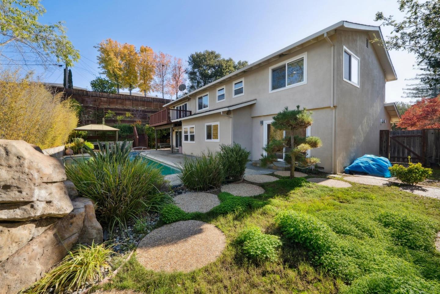 900 Highlands Circle Los Altos, CA 94024 - Photo 73 of 76 a view of a house with backyard and sitting area