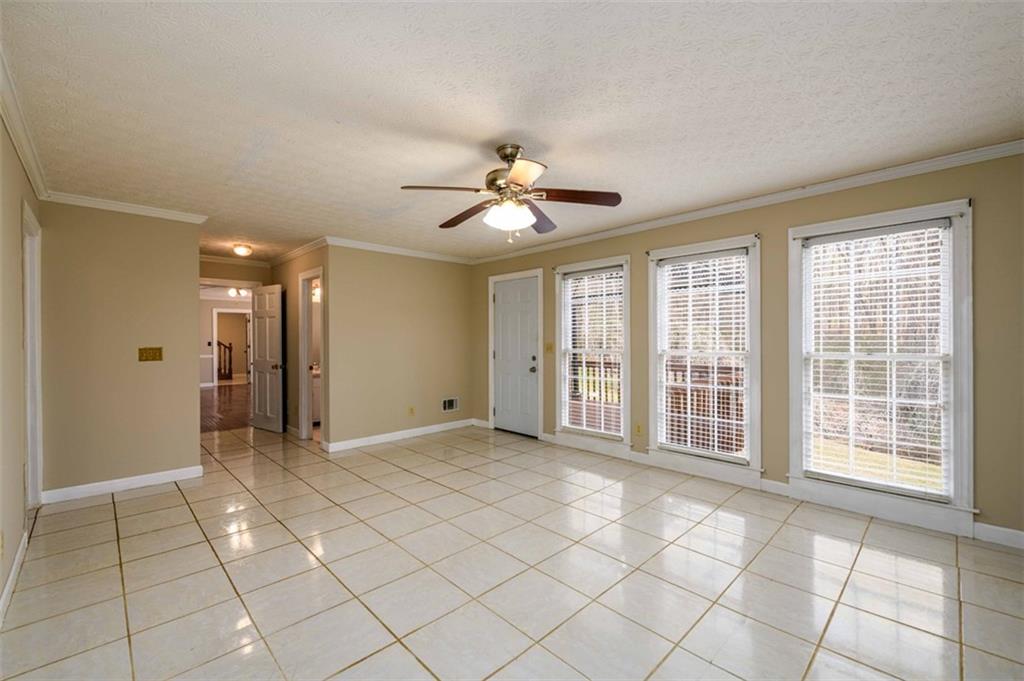 6420 Phillips Place Lithonia, GA 30058 - Photo 20 of 40 a view of an empty room with a window