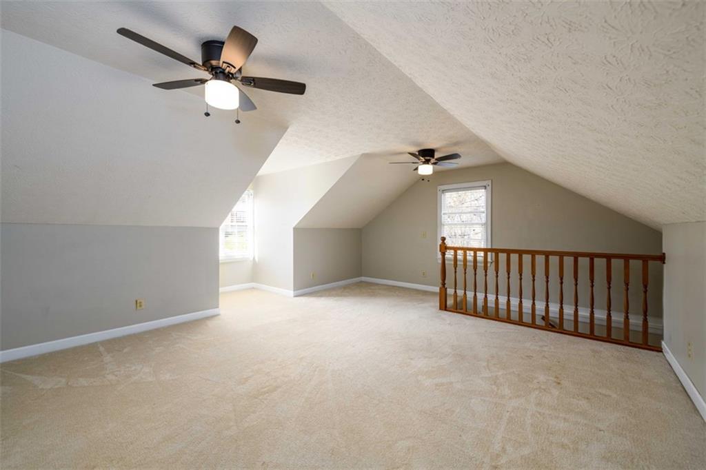 6420 Phillips Place Lithonia, GA 30058 - Photo 21 of 40 wooden floor in an empty room