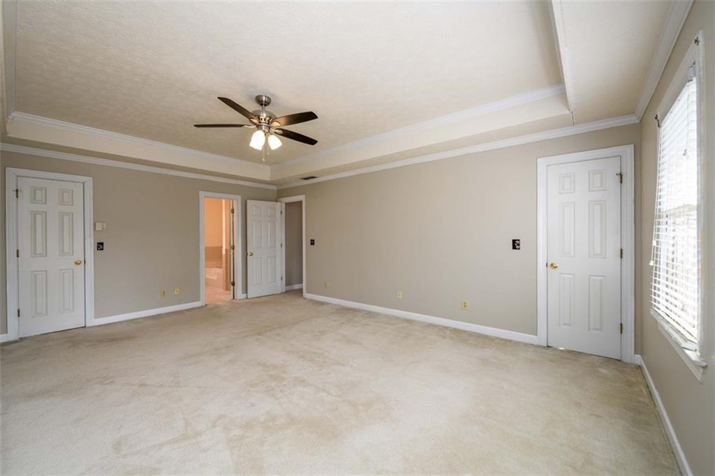 6420 Phillips Place Lithonia, GA 30058 - Photo 24 of 40 a view of an empty room with a window