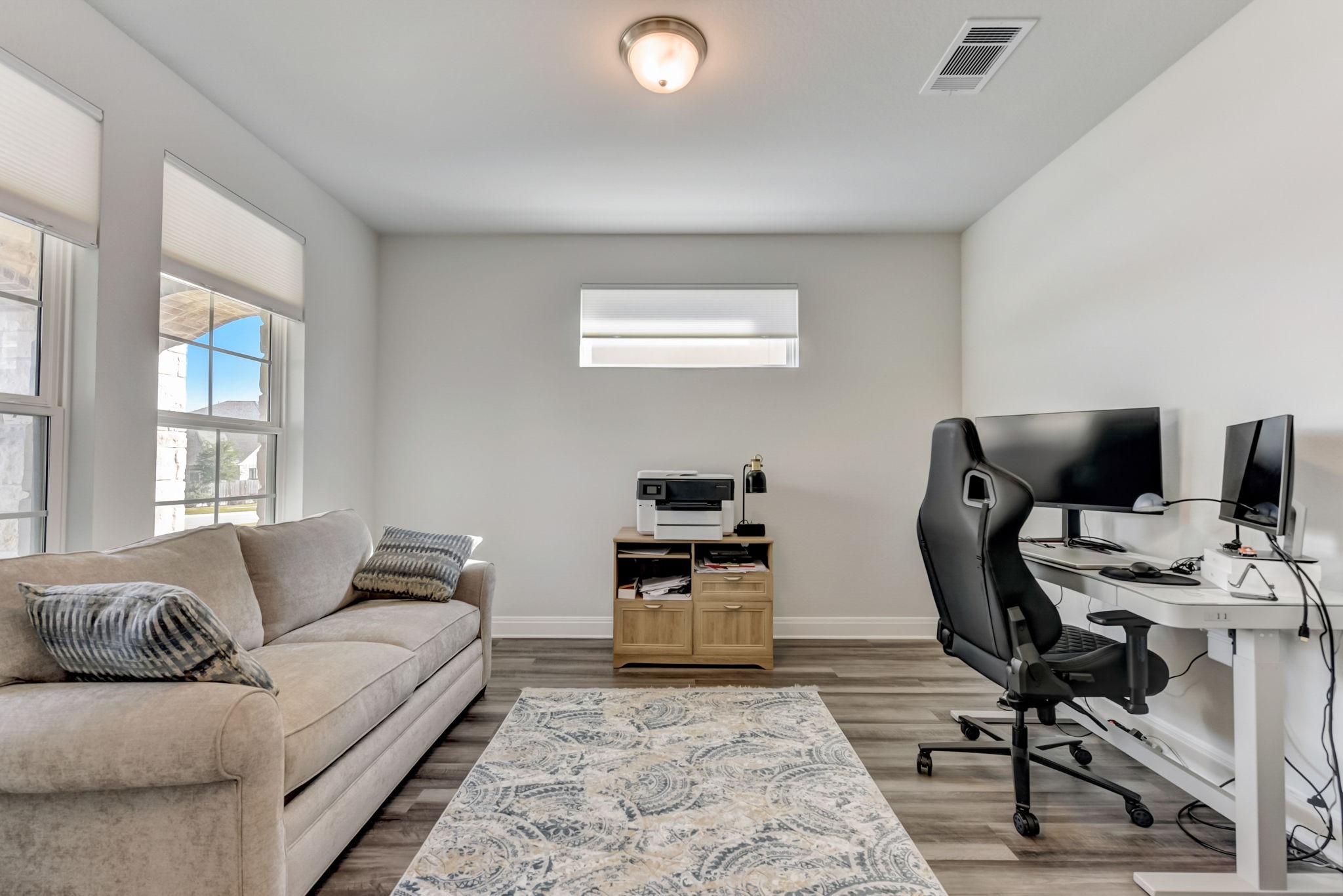 2121 Prairie Oaks Drive Georgetown, TX 78628 - Photo 6 of 40 a living room with furniture and a window