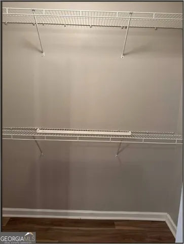 a view of a room with racks on the wall