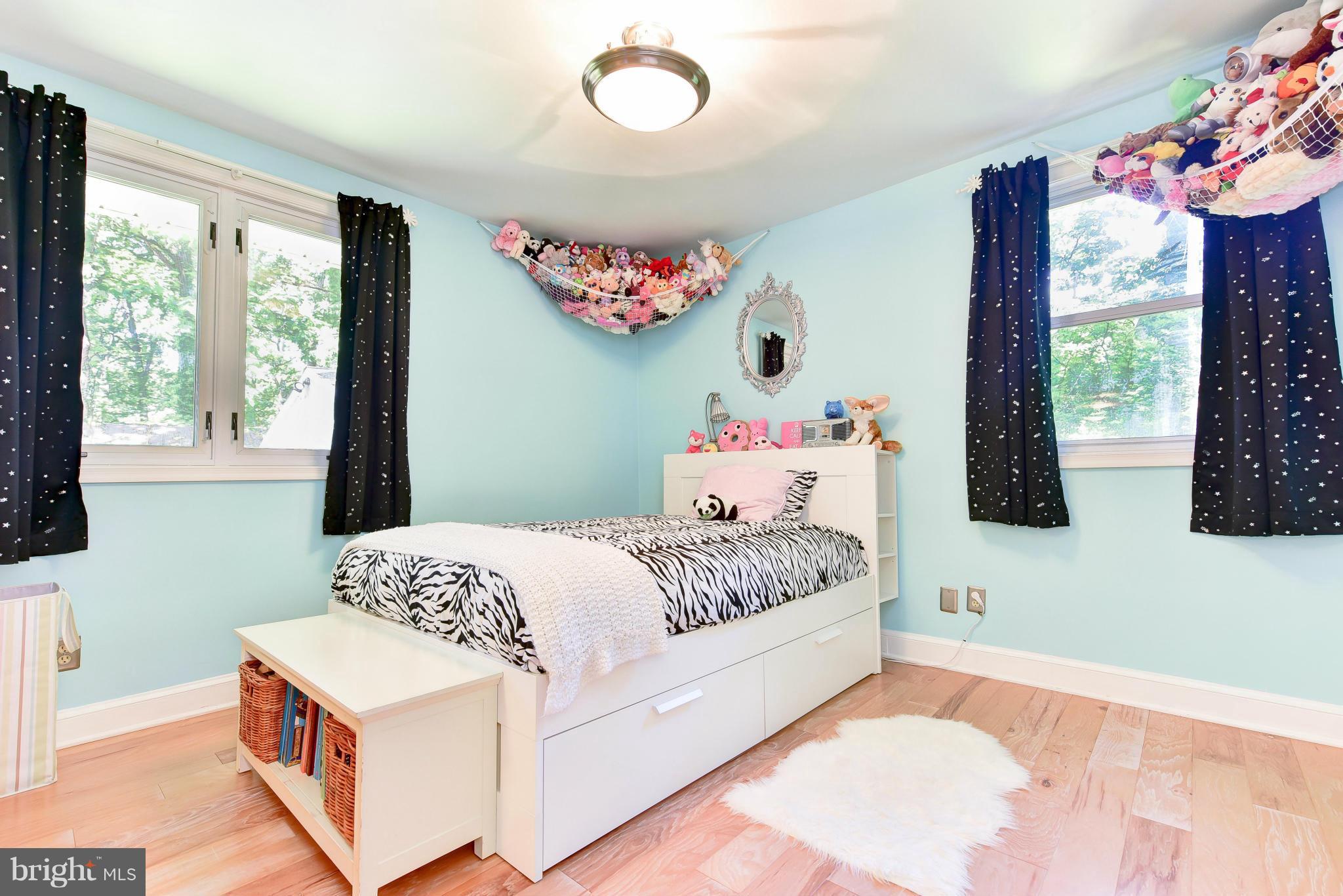 1312 Namassin Road Alexandria, VA 22308 - Photo 12 of 30 a bedroom with a bed and window