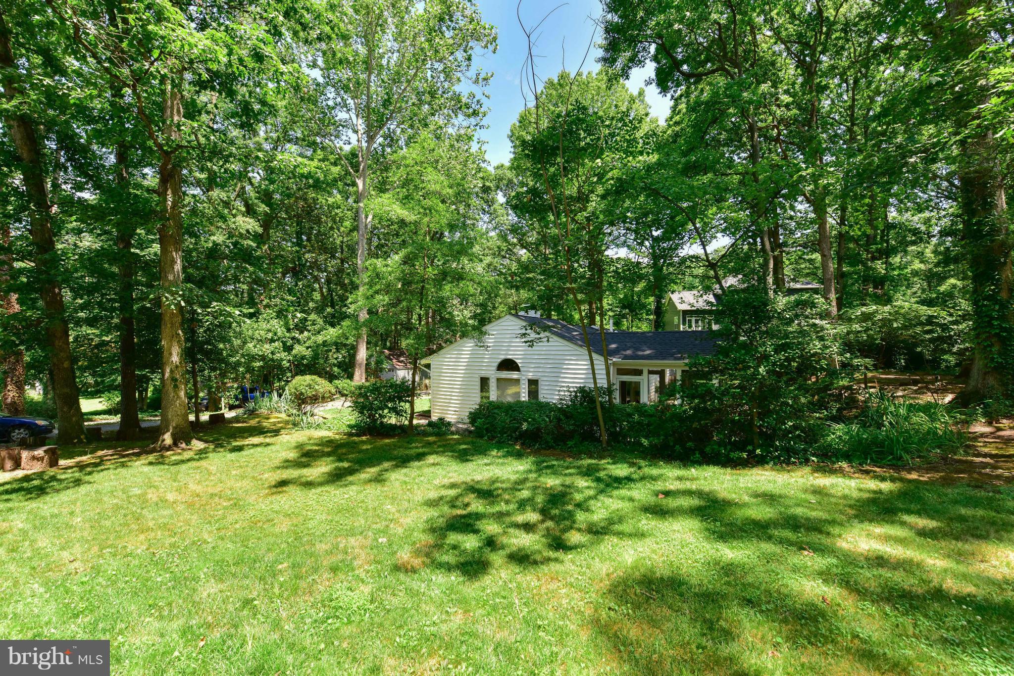 1312 Namassin Road Alexandria, VA 22308 - Photo 21 of 30 a house view with a garden