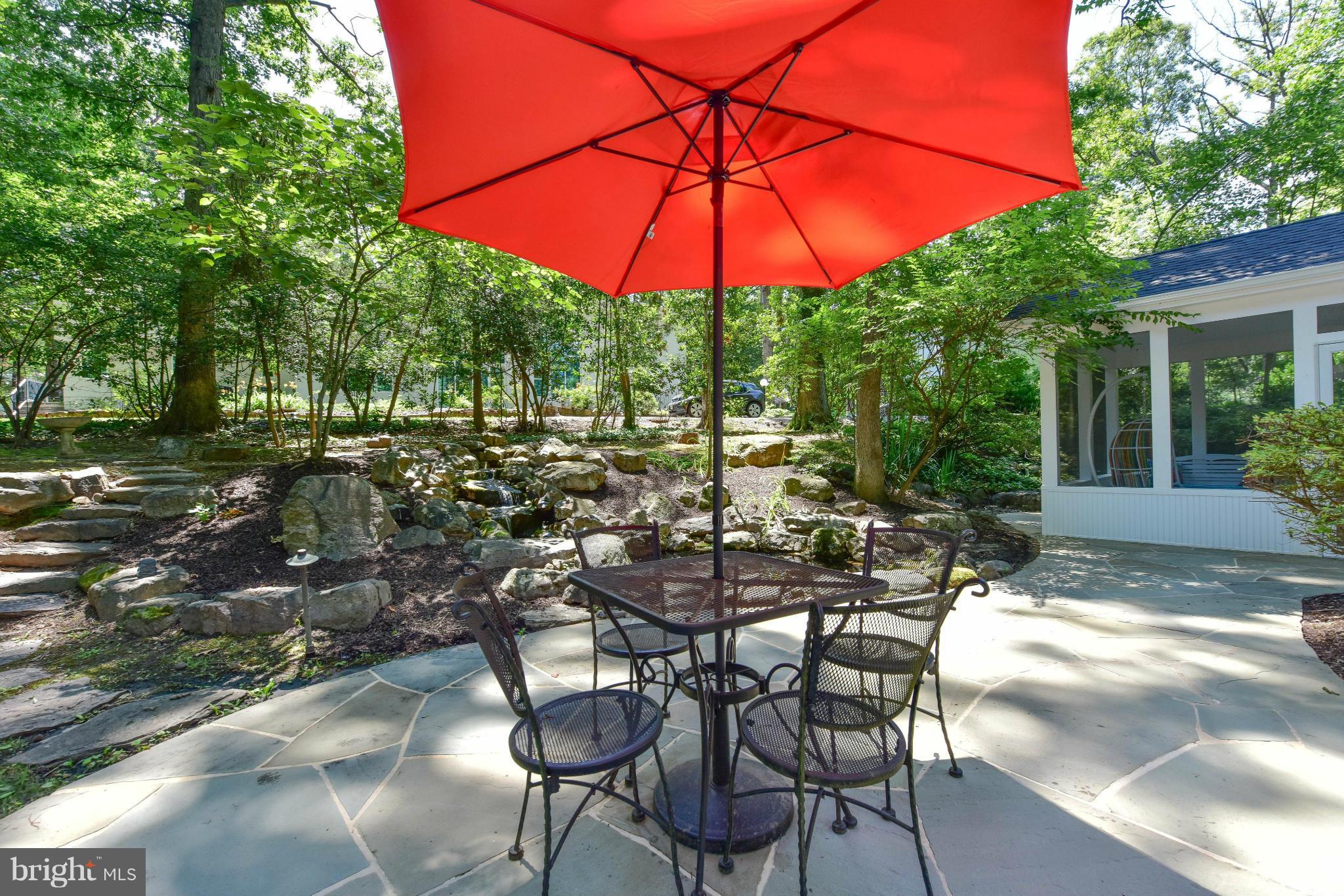 1312 Namassin Road Alexandria, VA 22308 - Photo 23 of 30 a view of a backyard with sitting area and furniture