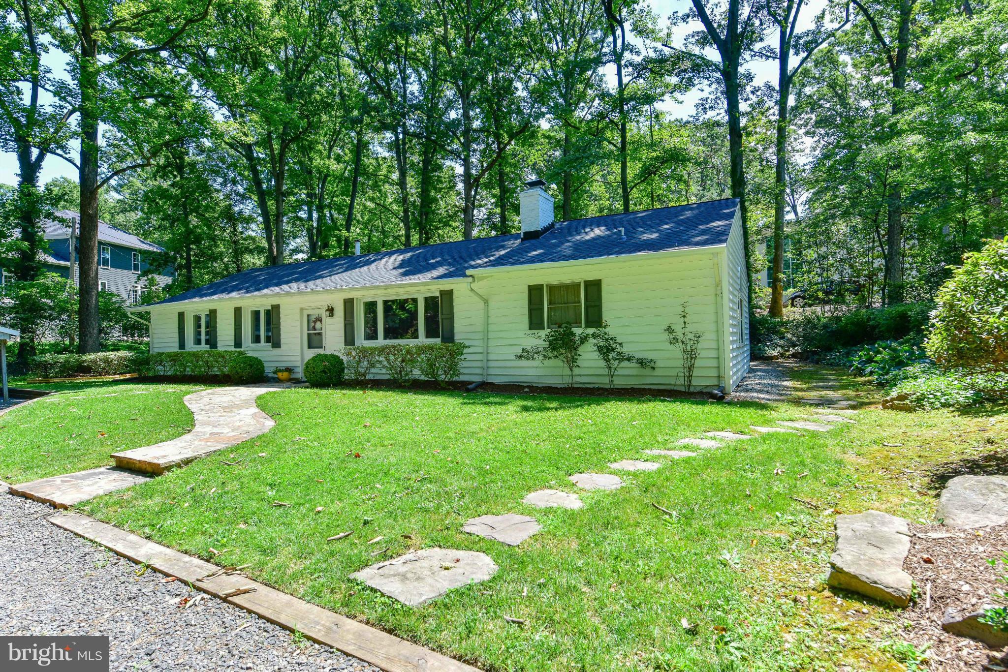 1312 Namassin Road Alexandria, VA 22308 - Photo 26 of 30 a view of an house with backyard space and balcony