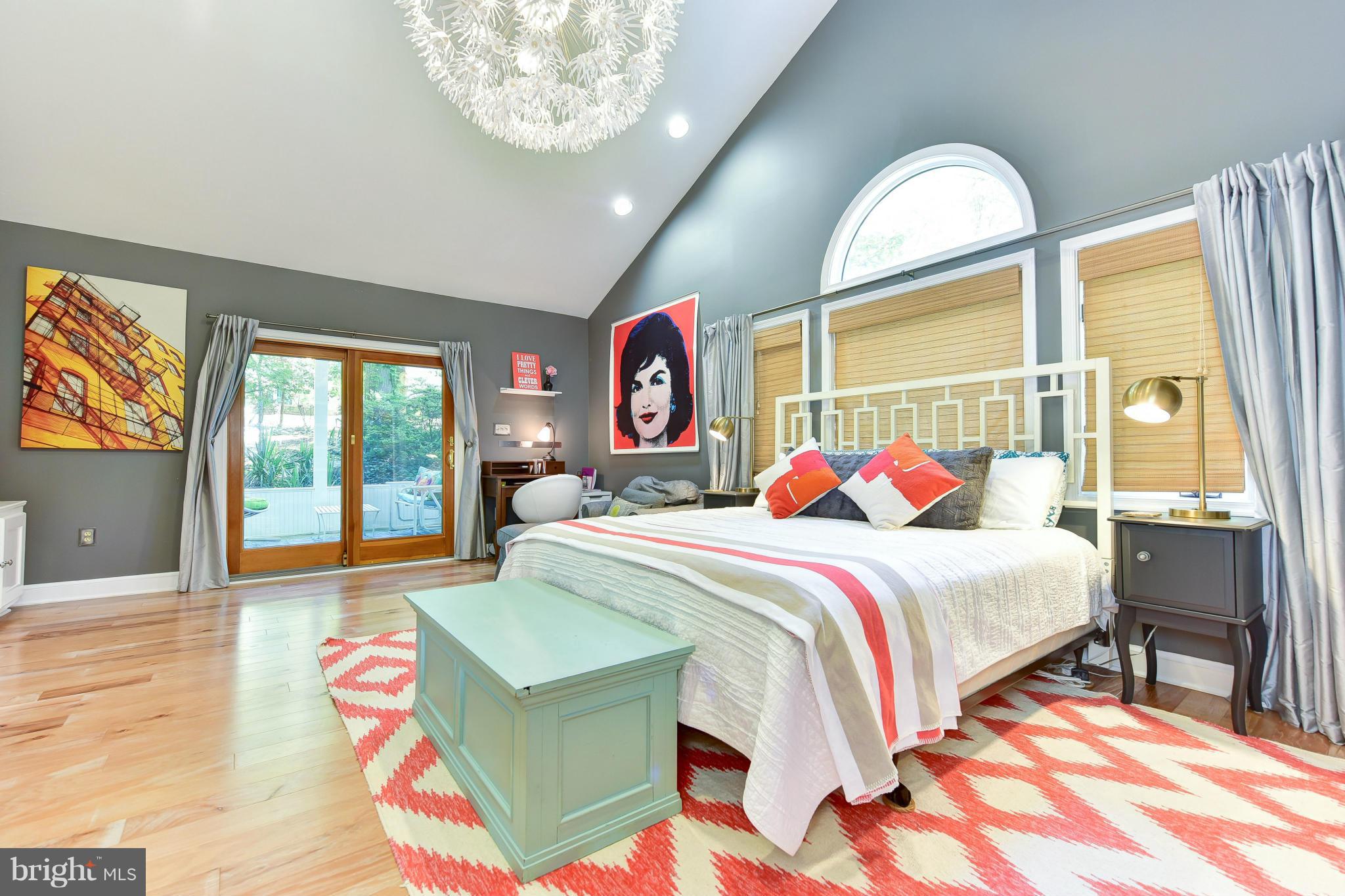 1312 Namassin Road Alexandria, VA 22308 - Photo 10 of 30 a bedroom with a bed and a large window