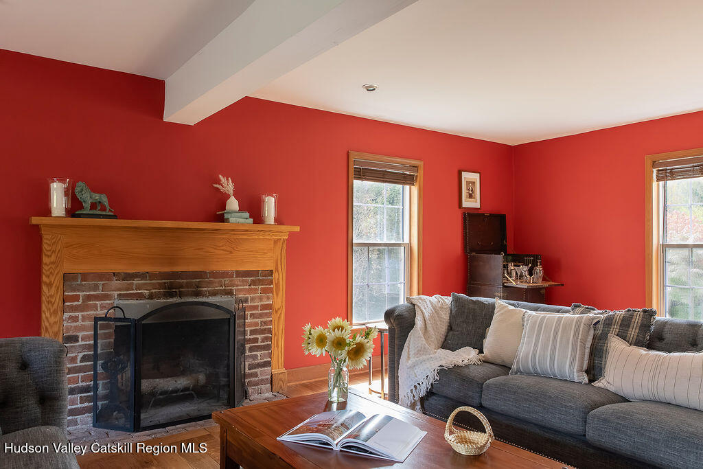 1457 N Road Blenheim, NY 12131 - Photo 3 of 43 a living room with furniture and a fireplace