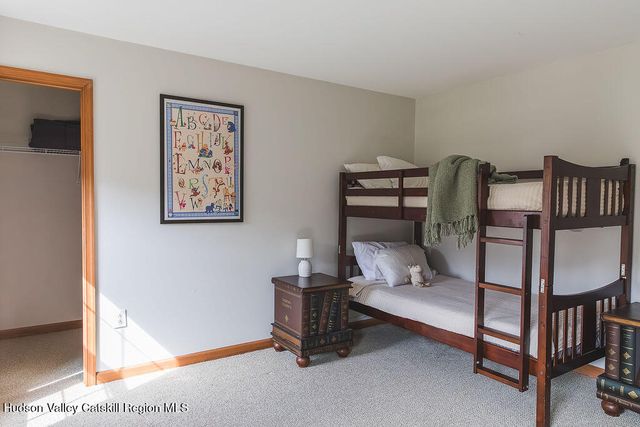 a view of livingroom with furniture and window