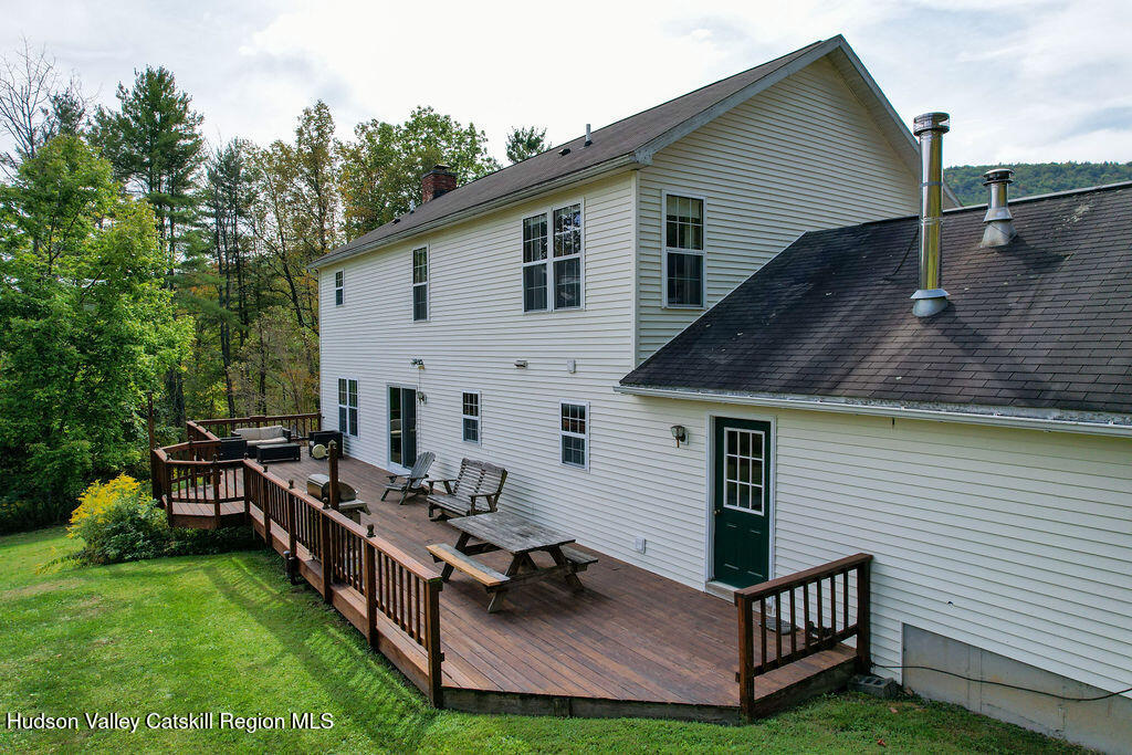 1457 N Road Blenheim, NY 12131 - Photo 36 of 43 a view of a house with backyard and sitting area