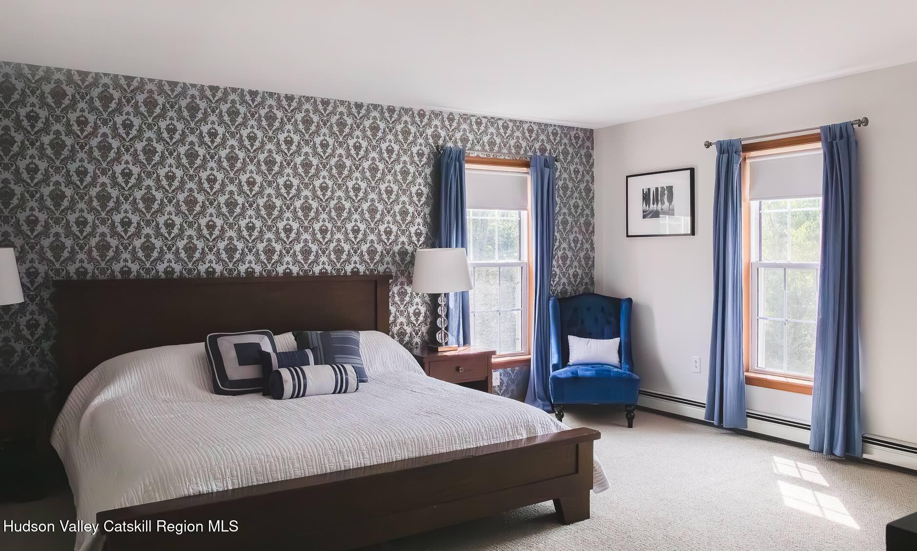 1457 N Road Blenheim, NY 12131 - Photo 4 of 43 a bedroom with a bed and a table