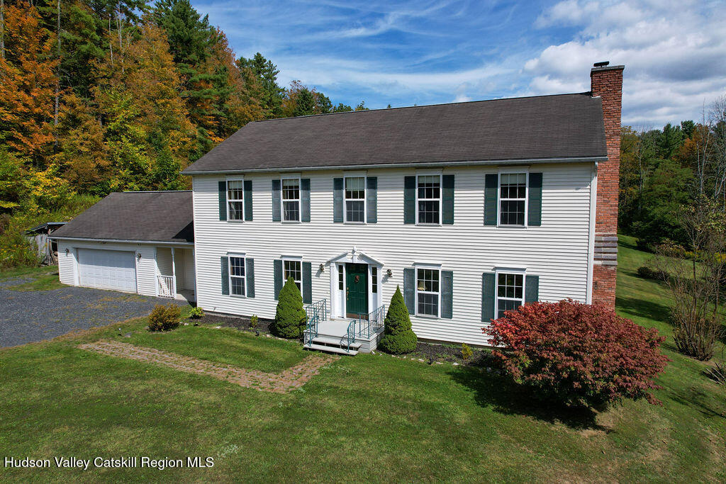 1457 N Road Blenheim, NY 12131 - Photo 8 of 43 front view of a house with a yard