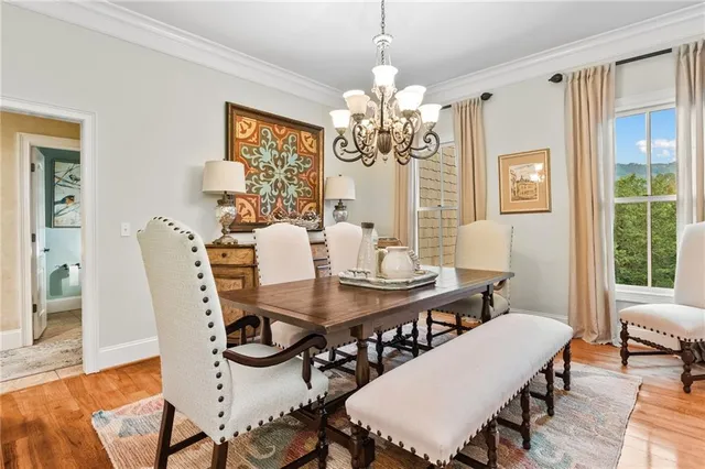 a spacious bedroom with a bed and a window