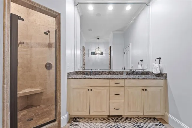 a bedroom with two beds and a window