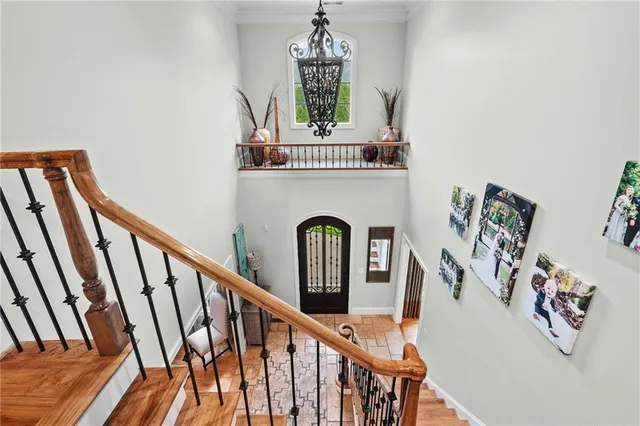 a bathroom with a sink a toilet and a window