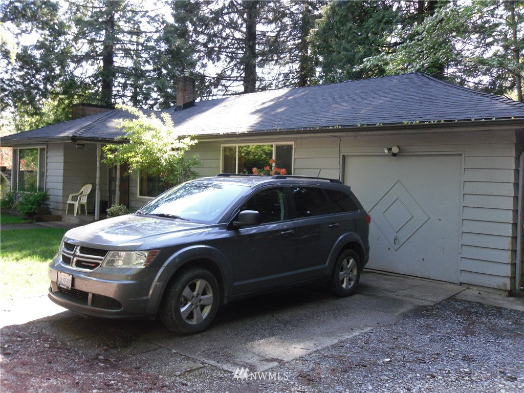 5225 228th Street Southeast Bothell, WA 98021 - Photo 2 of 2 a view of a car in front of house