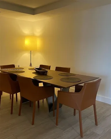 a view of a table and chairs in the terrace