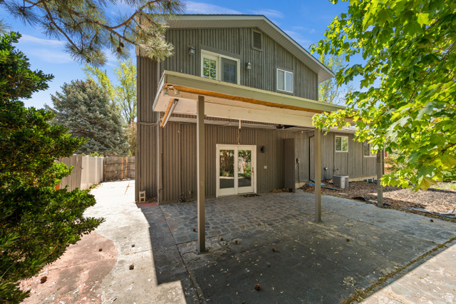 2163 Borg Drive Sandy, UT 84092 - Photo 31 of 31 Back of property with a patio