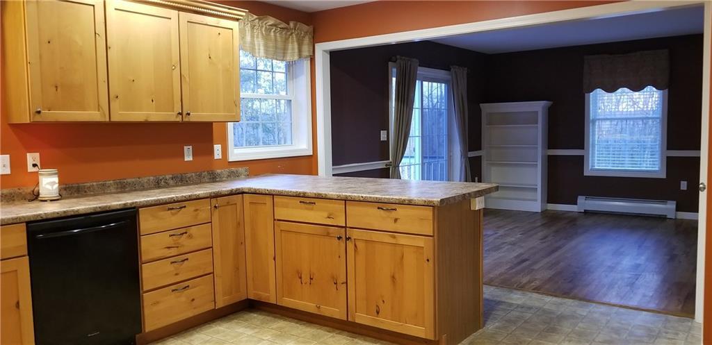 430 Back Road Shapleigh, ME 04076 - Photo 12 of 34 Kitchen has an open concept to the...