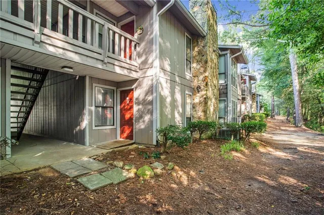 a view of a building with brick walls