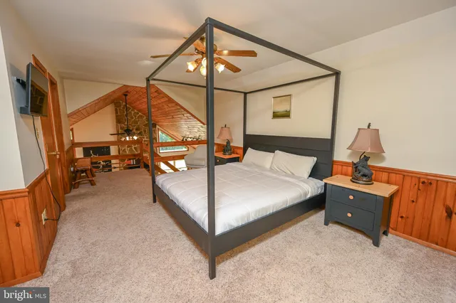 a view of a balcony with wooden floor