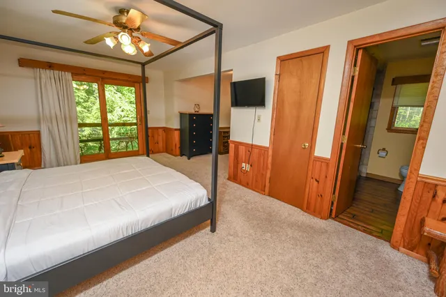 a view of a chairs and table on the wooden floor