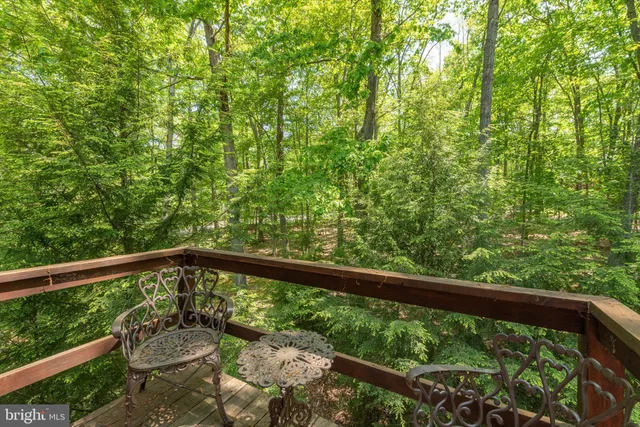 wooden view of play ground with a small yard