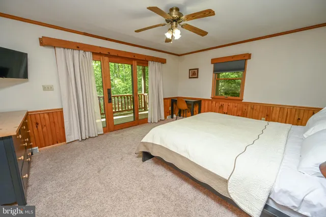 a view of a park with swings and slides