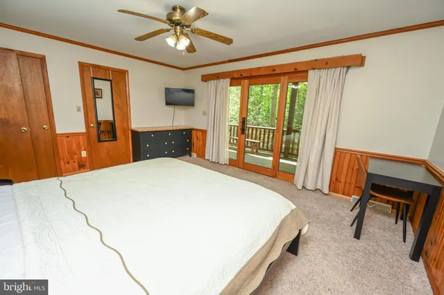 a large building with river in front of it