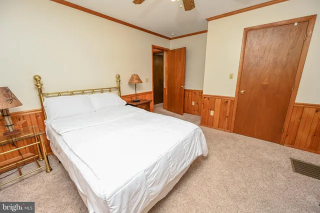 a view of a house with a yard and plants