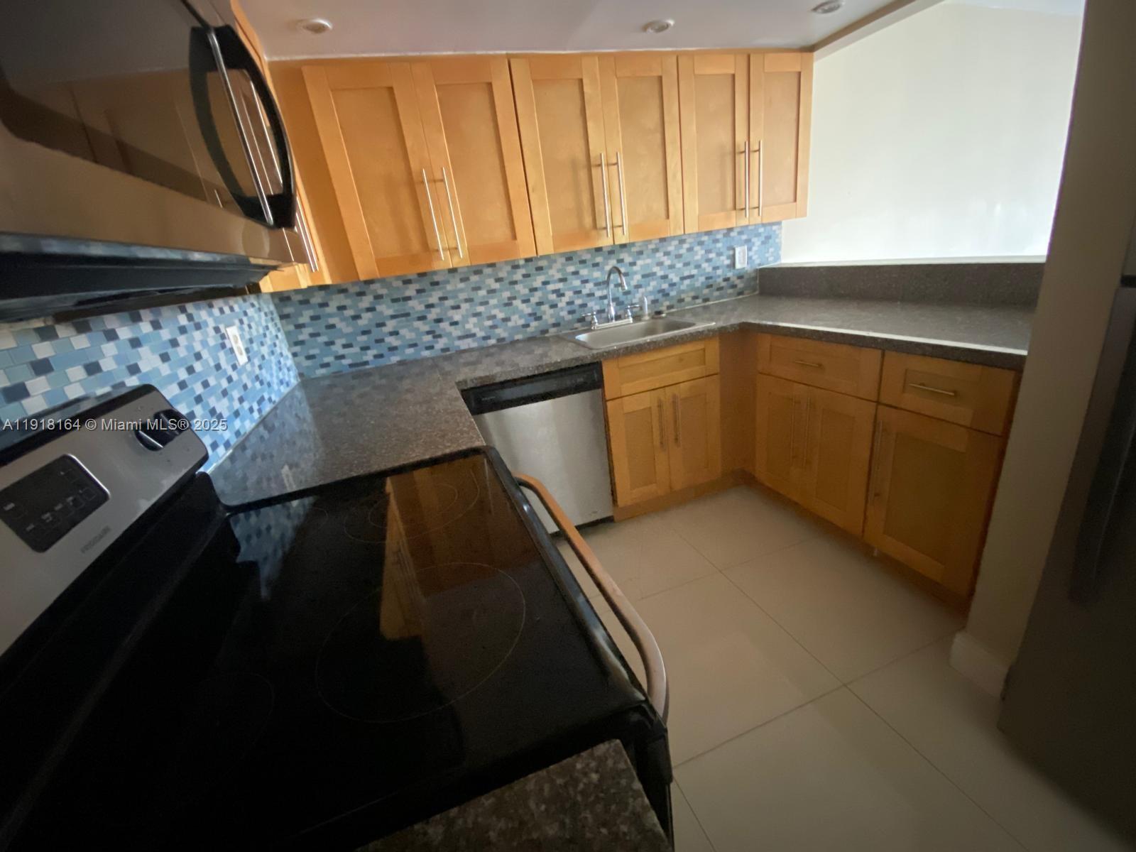 6970 Northwest 186th Street, Unit 3410 Hialeah, FL 33015 - Photo 4 of 10 a view of utility room