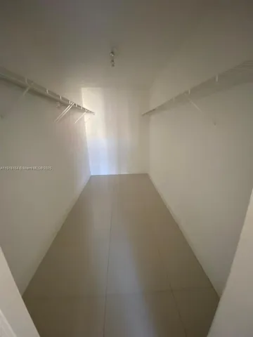 a view of a room with an empty space