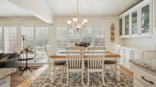 a view of a dining room with furniture