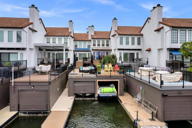 a front view of a building with sitting area