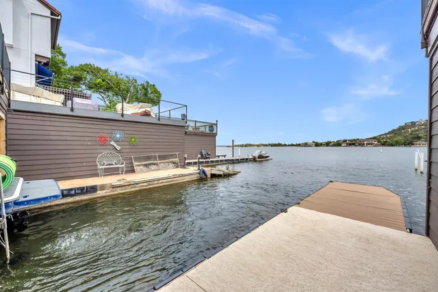 a view of a swimming pool with a lake view